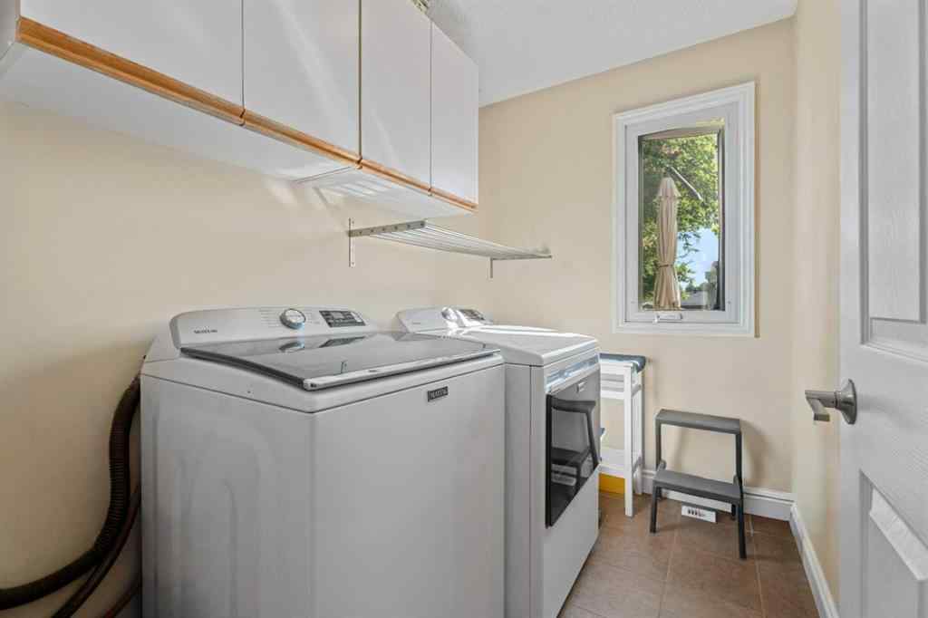 MLS® A2256876 - 1205 Meadowbrook Drive SE in Meadowbrook Airdrie, Residential