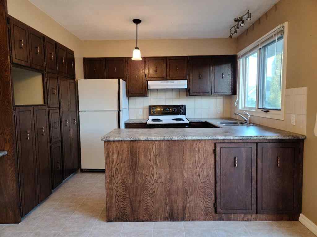 MLS® A2256884 - 7413 96 Street  in North End Peace River, Residential