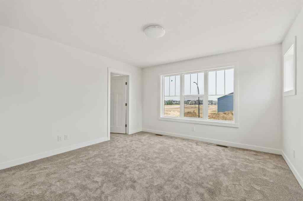 MLS® A2256886 - 280 Creekstone Circle SW in Pine Creek Calgary, Residential