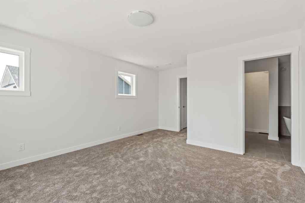 MLS® A2256886 - 280 Creekstone Circle SW in Pine Creek Calgary, Residential