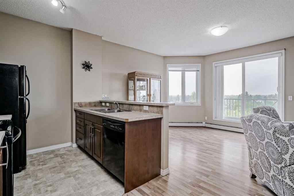MLS® A2256887 - Unit #401 1727 54 Street SE in Penbrooke Meadows Calgary, Residential
