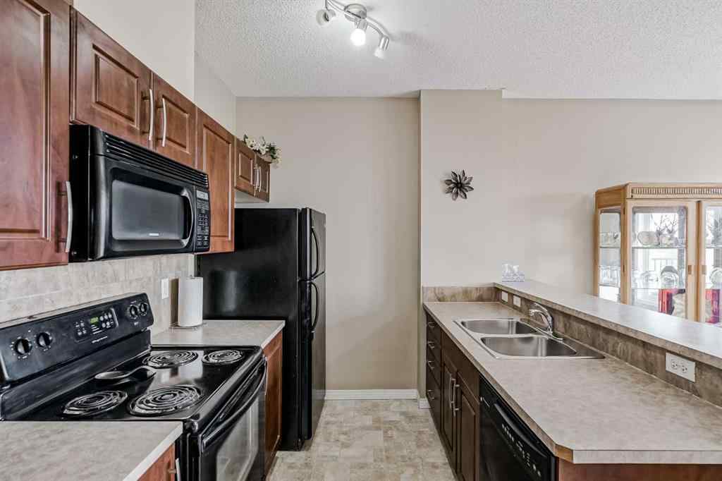 MLS® A2256887 - Unit #401 1727 54 Street SE in Penbrooke Meadows Calgary, Residential
