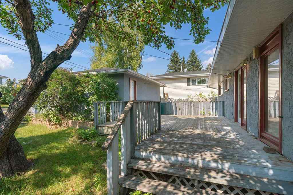 MLS® A2256911 - 34 Kendall Place SW in Kingsland Calgary, Residential