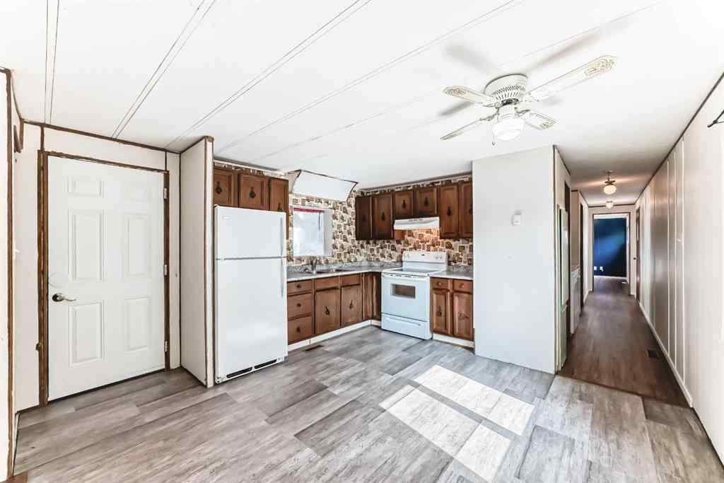 MLS® A2256912 - 100 Spring Haven Close SE in Big Springs Airdrie, Residential