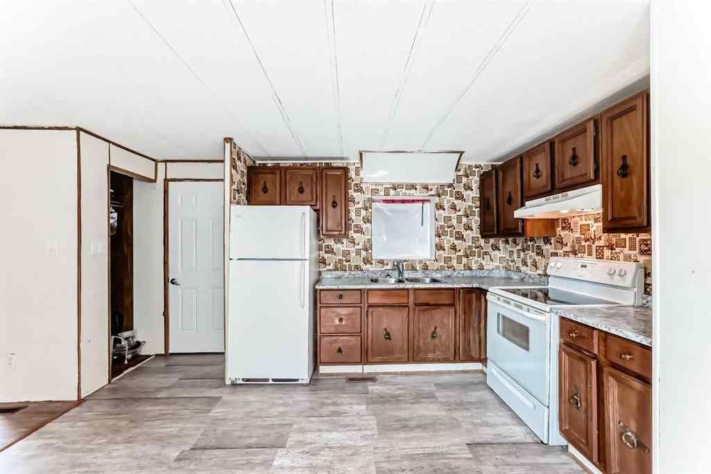 MLS® A2256912 - 100 Spring Haven Close SE in Big Springs Airdrie, Residential