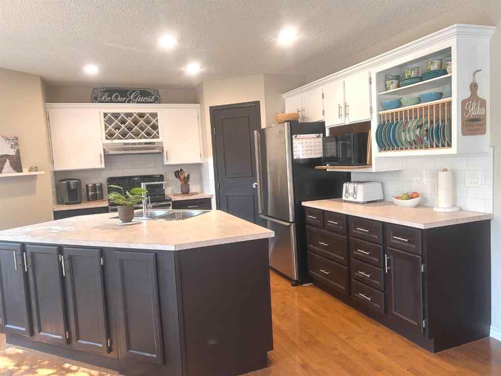 MLS® A2256931 - 101 Sundown Way SE in Sundance Calgary, Residential