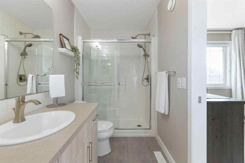 MLS® A2256933 - 272 Sundown Road  in Sunset Ridge Cochrane, Residential