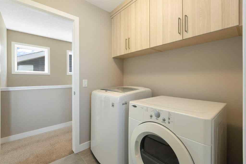 MLS® A2256933 - 272 Sundown Road  in Sunset Ridge Cochrane, Residential