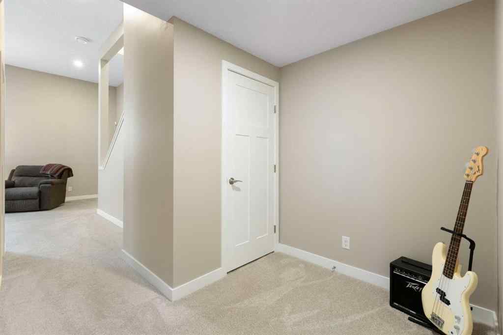 MLS® A2256933 - 272 Sundown Road  in Sunset Ridge Cochrane, Residential