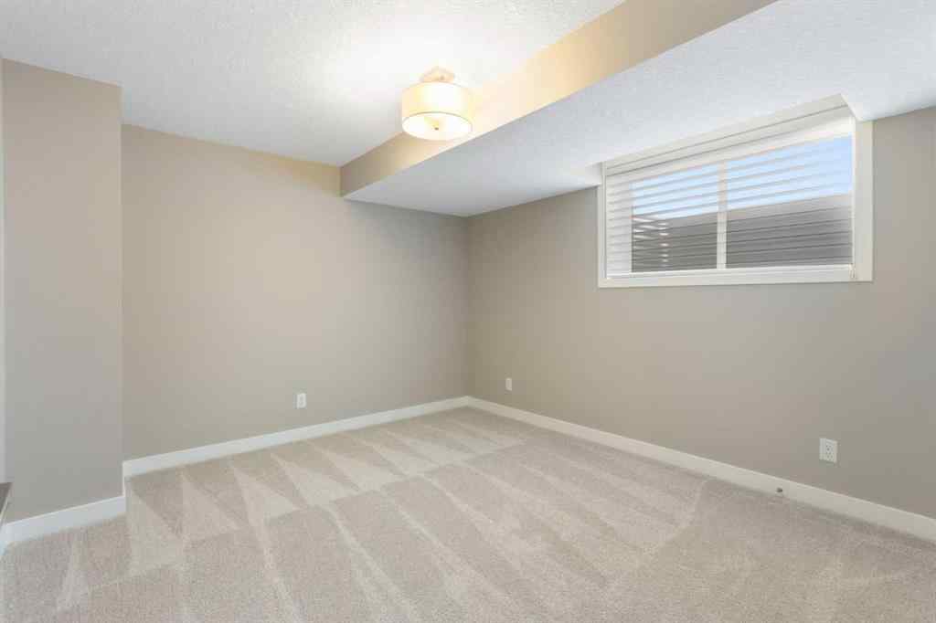 MLS® A2256933 - 272 Sundown Road  in Sunset Ridge Cochrane, Residential