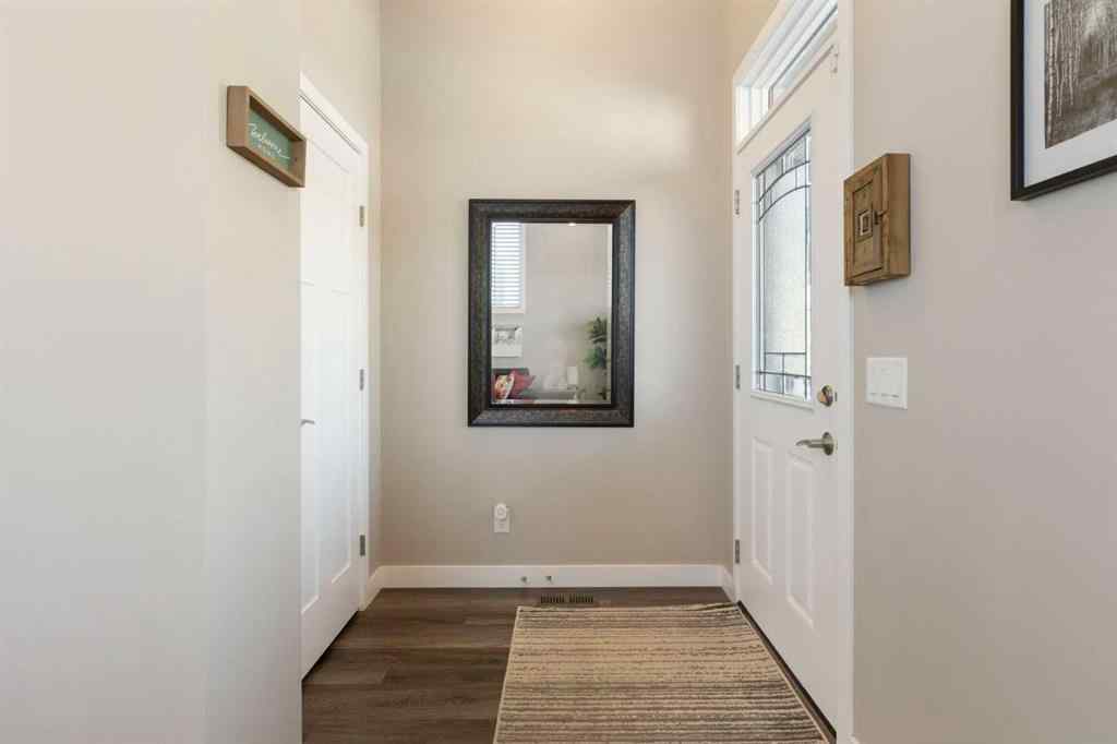 MLS® A2256933 - 272 Sundown Road  in Sunset Ridge Cochrane, Residential