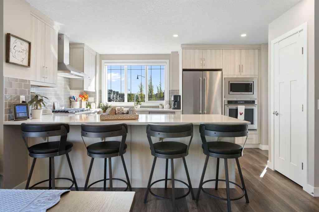 MLS® A2256933 - 272 Sundown Road  in Sunset Ridge Cochrane, Residential