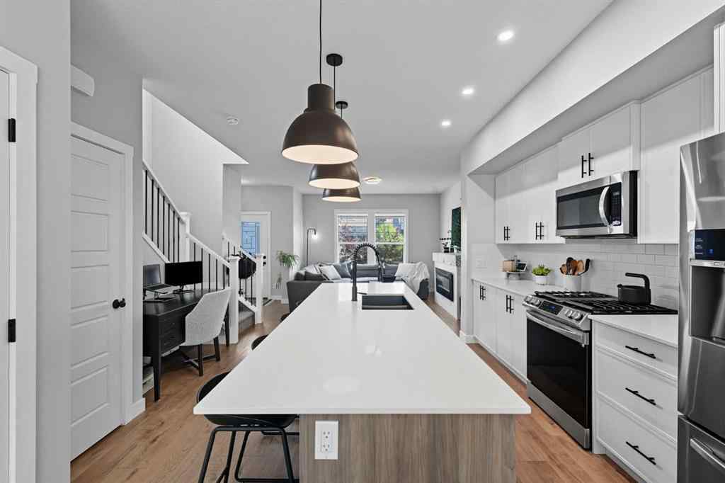 MLS® A2256936 - 443 Hillcrest Manor SW in Hillcrest Airdrie, Residential