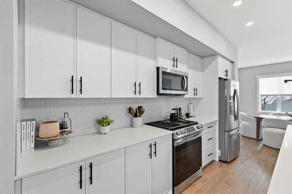 MLS® A2256936 - 443 Hillcrest Manor SW in Hillcrest Airdrie, Residential