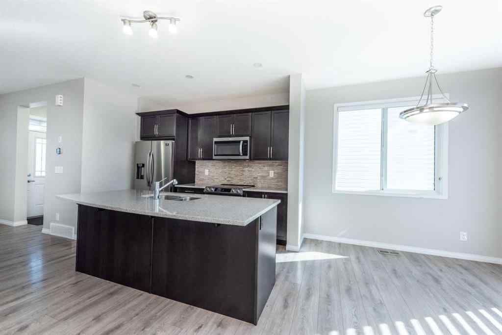 MLS® A2256941 - 324 Carrington Way NW in Carrington Calgary, Residential