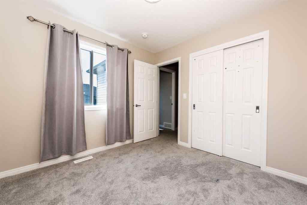 MLS® A2256941 - 324 Carrington Way NW in Carrington Calgary, Residential