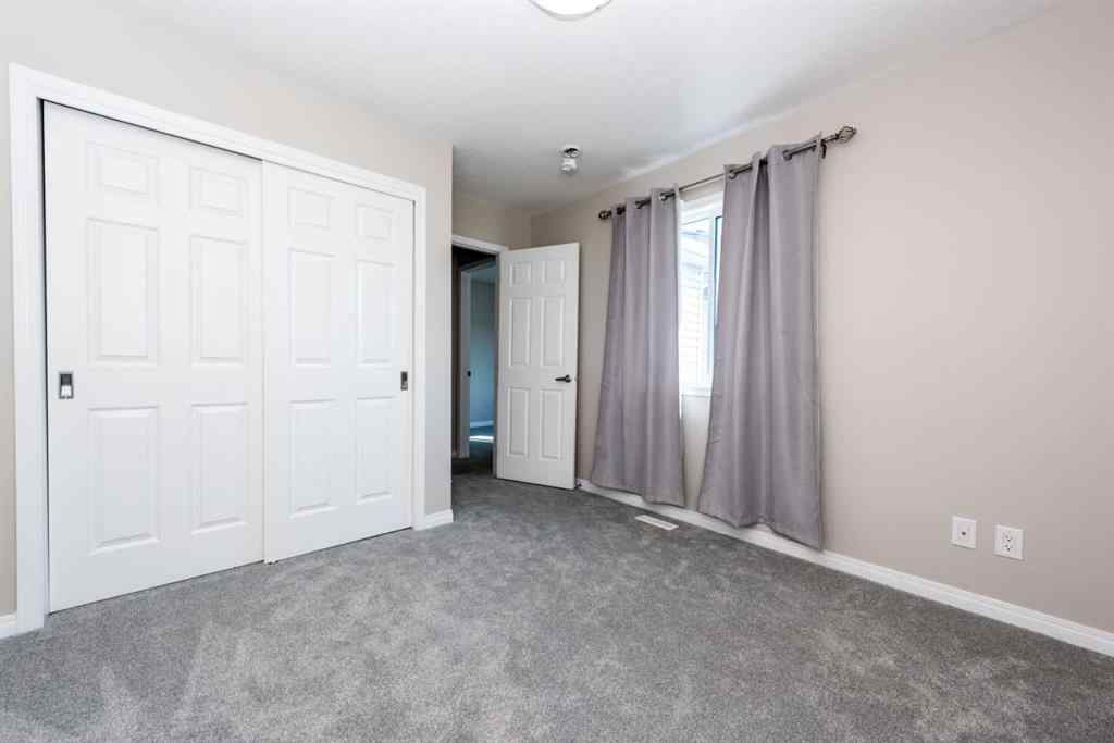 MLS® A2256941 - 324 Carrington Way NW in Carrington Calgary, Residential