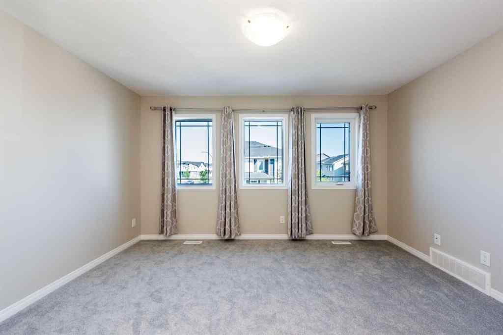 MLS® A2256941 - 324 Carrington Way NW in Carrington Calgary, Residential