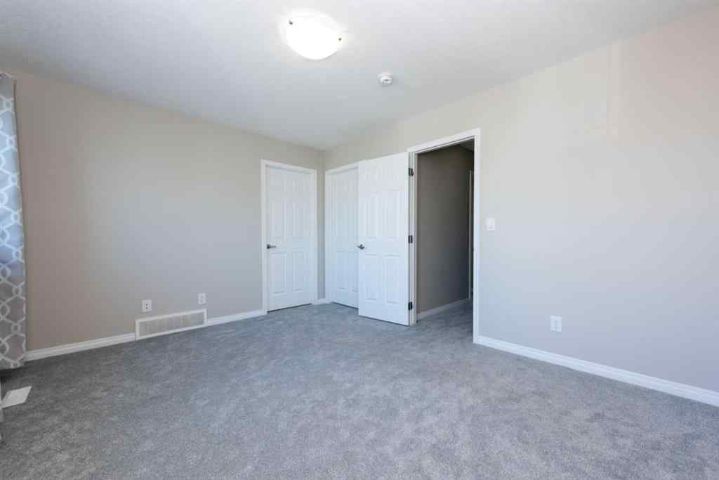 MLS® A2256941 - 324 Carrington Way NW in Carrington Calgary, Residential