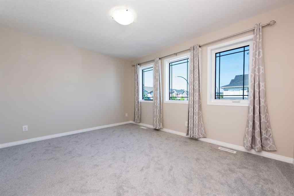 MLS® A2256941 - 324 Carrington Way NW in Carrington Calgary, Residential