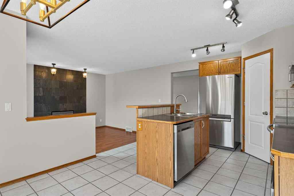 MLS® A2256959 - 47 Mt Apex Crescent SE in McKenzie Lake Calgary, Residential