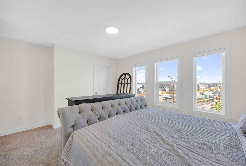 MLS® A2256964 - 182 Belmont Street SW in Belmont Calgary, Residential