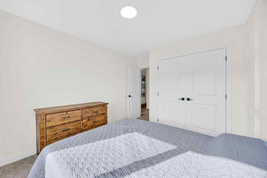MLS® A2256964 - 182 Belmont Street SW in Belmont Calgary, Residential
