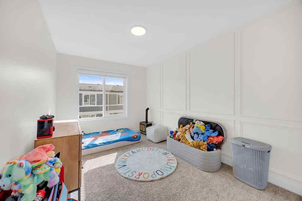 MLS® A2256964 - 182 Belmont Street SW in Belmont Calgary, Residential