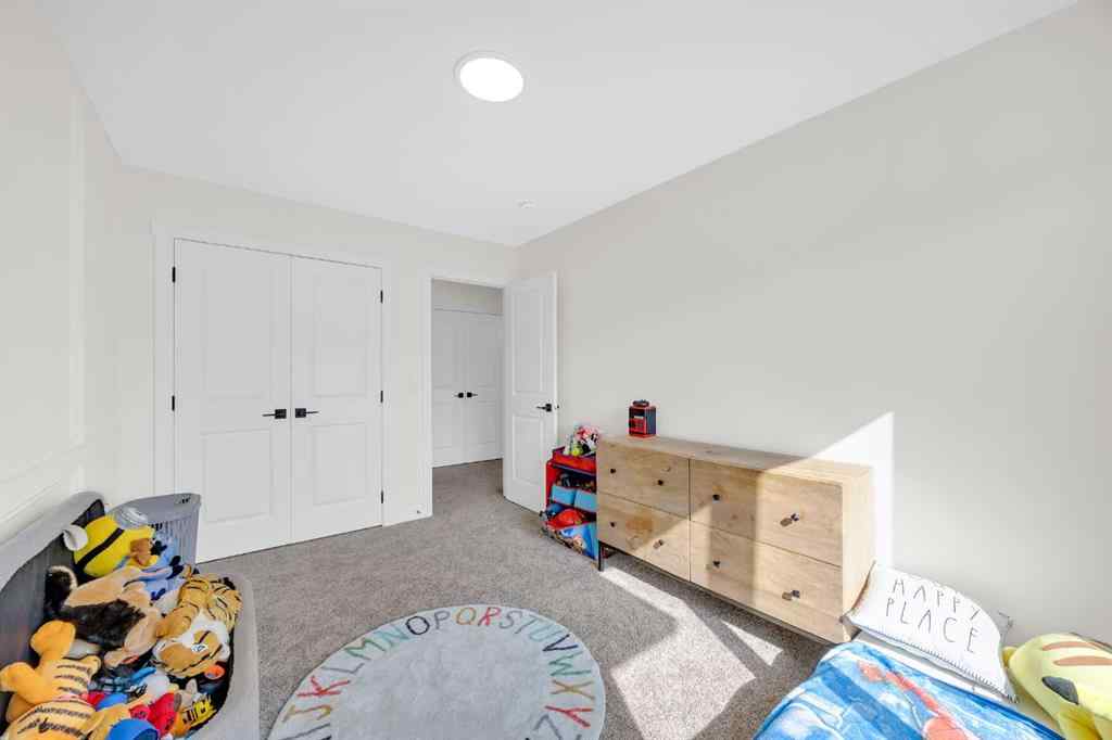 MLS® A2256964 - 182 Belmont Street SW in Belmont Calgary, Residential