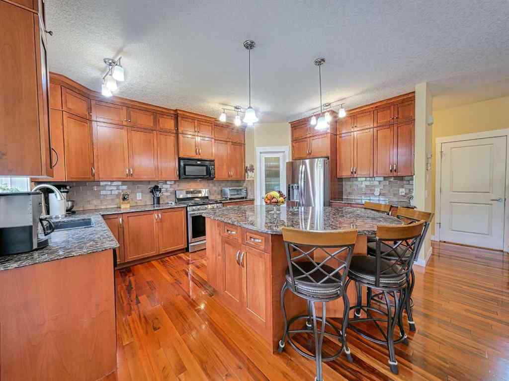MLS® A2256965 - 66 Crystal Green Drive  in Crystal Green Okotoks, Residential
