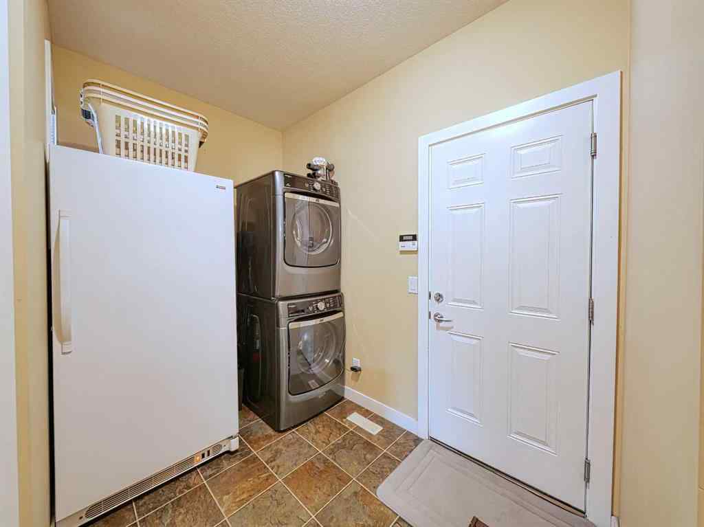 MLS® A2256965 - 66 Crystal Green Drive  in Crystal Green Okotoks, Residential