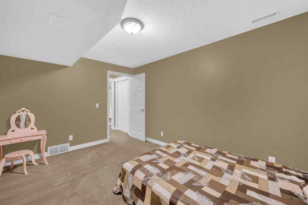 MLS® A2256968 - 2407 Kingsland View SE in Kings Heights Airdrie, Residential