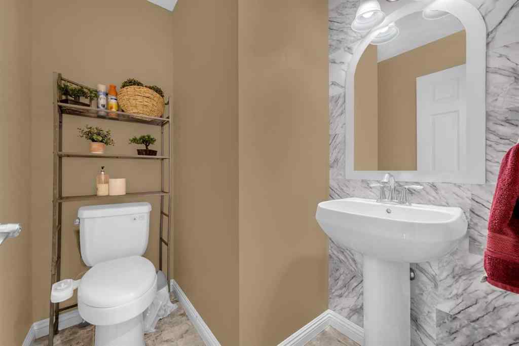 MLS® A2256968 - 2407 Kingsland View SE in Kings Heights Airdrie, Residential