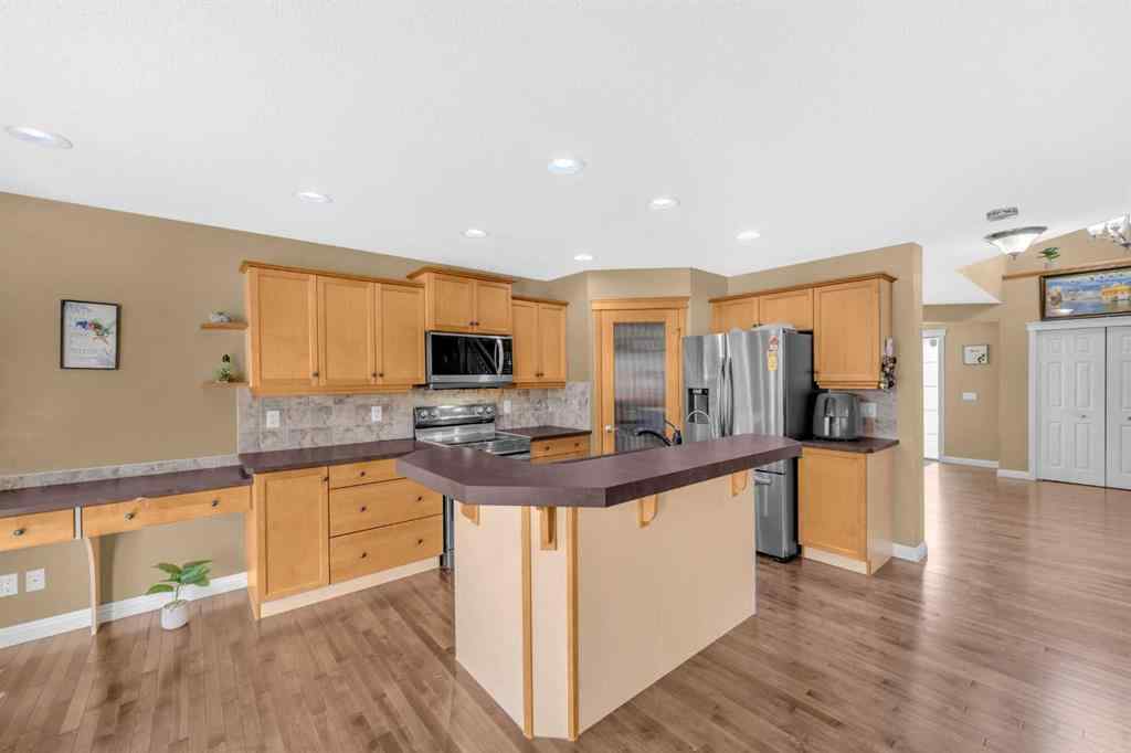 MLS® A2256968 - 2407 Kingsland View SE in Kings Heights Airdrie, Residential