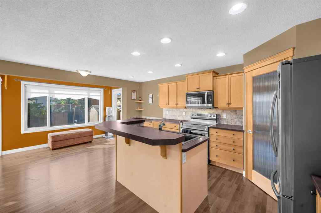 MLS® A2256968 - 2407 Kingsland View SE in Kings Heights Airdrie, Residential