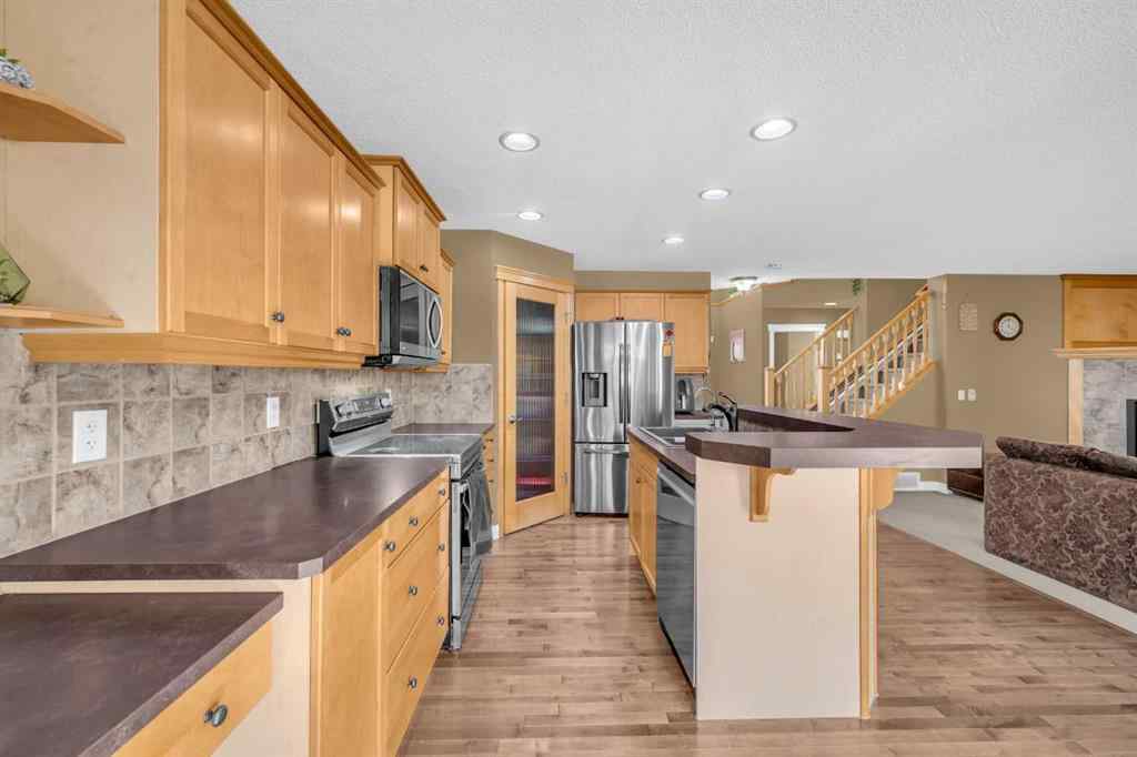 MLS® A2256968 - 2407 Kingsland View SE in Kings Heights Airdrie, Residential