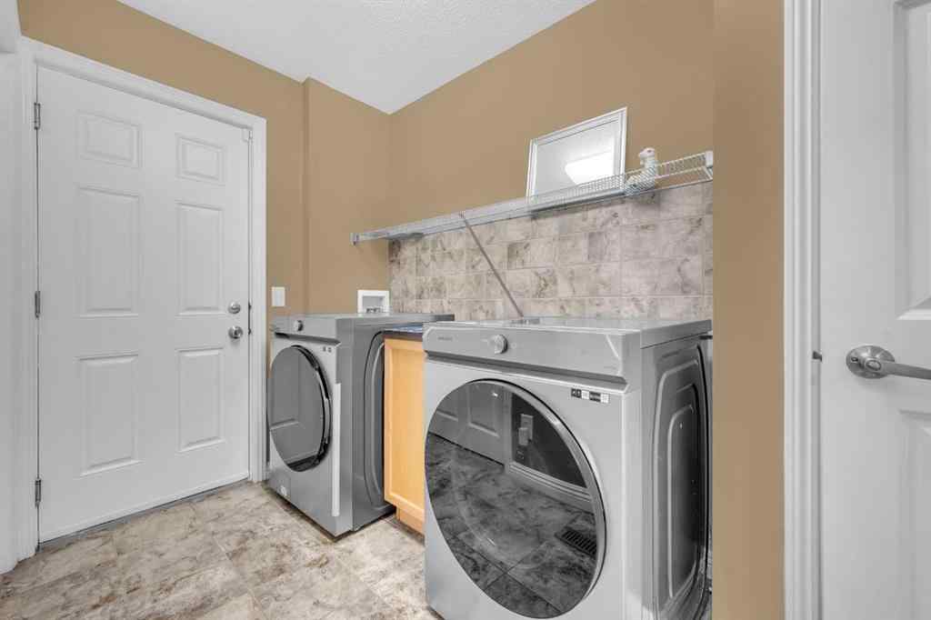 MLS® A2256968 - 2407 Kingsland View SE in Kings Heights Airdrie, Residential