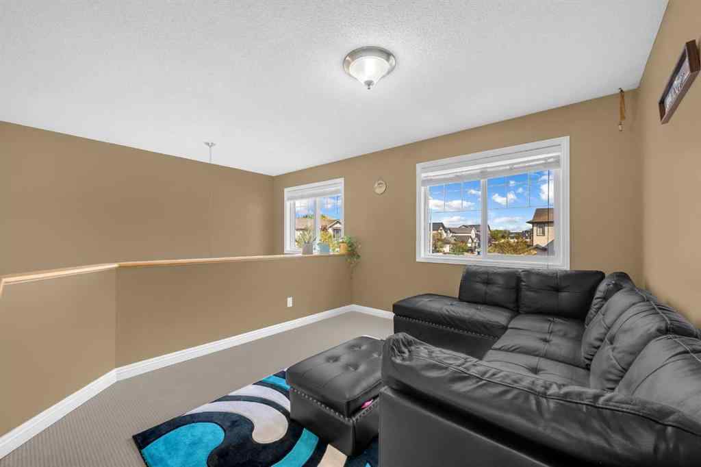 MLS® A2256968 - 2407 Kingsland View SE in Kings Heights Airdrie, Residential