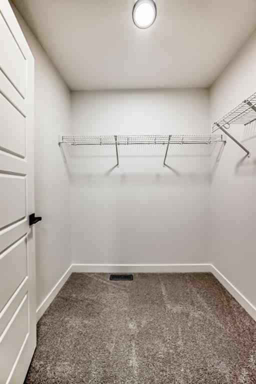 MLS® A2256975 - 20 Lewiston View NE in Lewisburg Calgary, Residential
