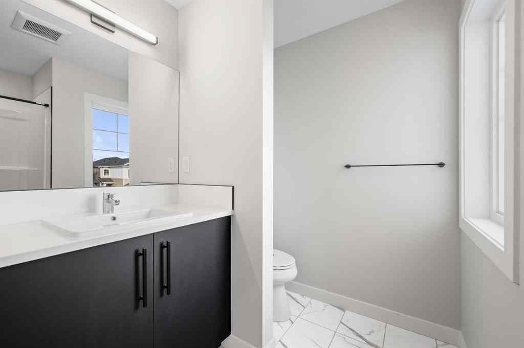 MLS® A2256977 - 26 Walgrove Bay SE in Walden Calgary, Residential