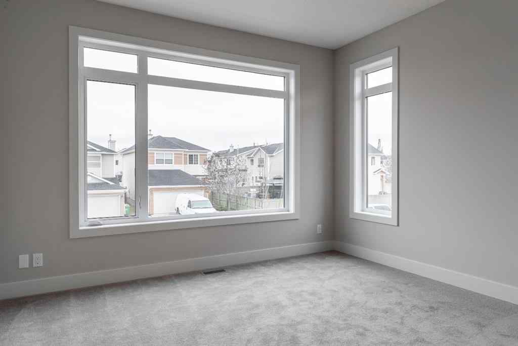 MLS® A2257006 - 261 Royal Elm Road NW in Royal Oak Calgary, Residential