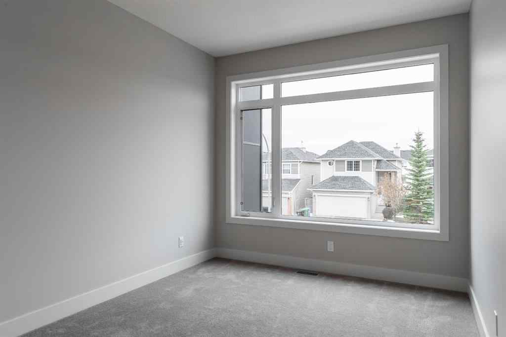 MLS® A2257006 - 261 Royal Elm Road NW in Royal Oak Calgary, Residential