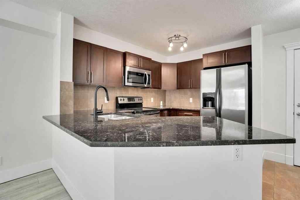 MLS® A2257007 - Unit #103 500 Rocky Vista Gardens NW in Rocky Ridge Calgary, Residential