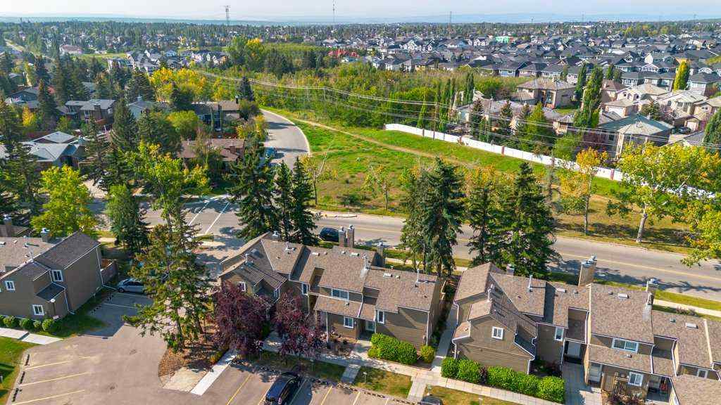 MLS® A2257022 - Unit #104 829 Coach Bluff Crescent SW in Coach Hill Calgary, Residential