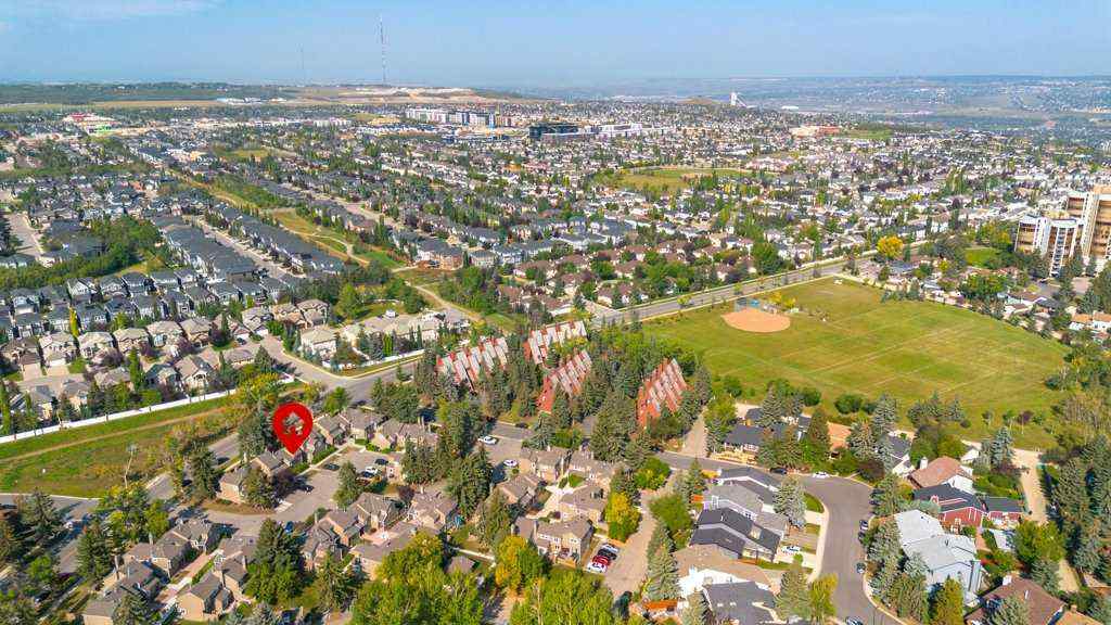 MLS® A2257022 - Unit #104 829 Coach Bluff Crescent SW in Coach Hill Calgary, Residential