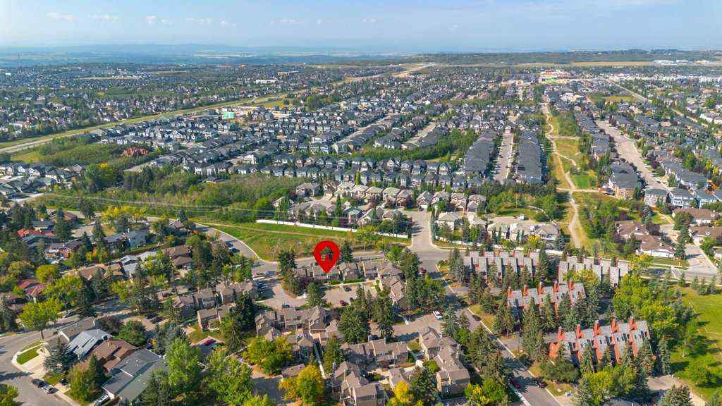 MLS® A2257022 - Unit #104 829 Coach Bluff Crescent SW in Coach Hill Calgary, Residential