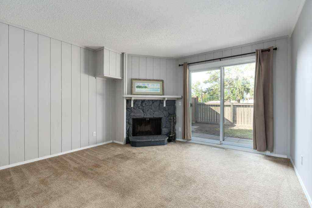 MLS® A2257022 - Unit #104 829 Coach Bluff Crescent SW in Coach Hill Calgary, Residential