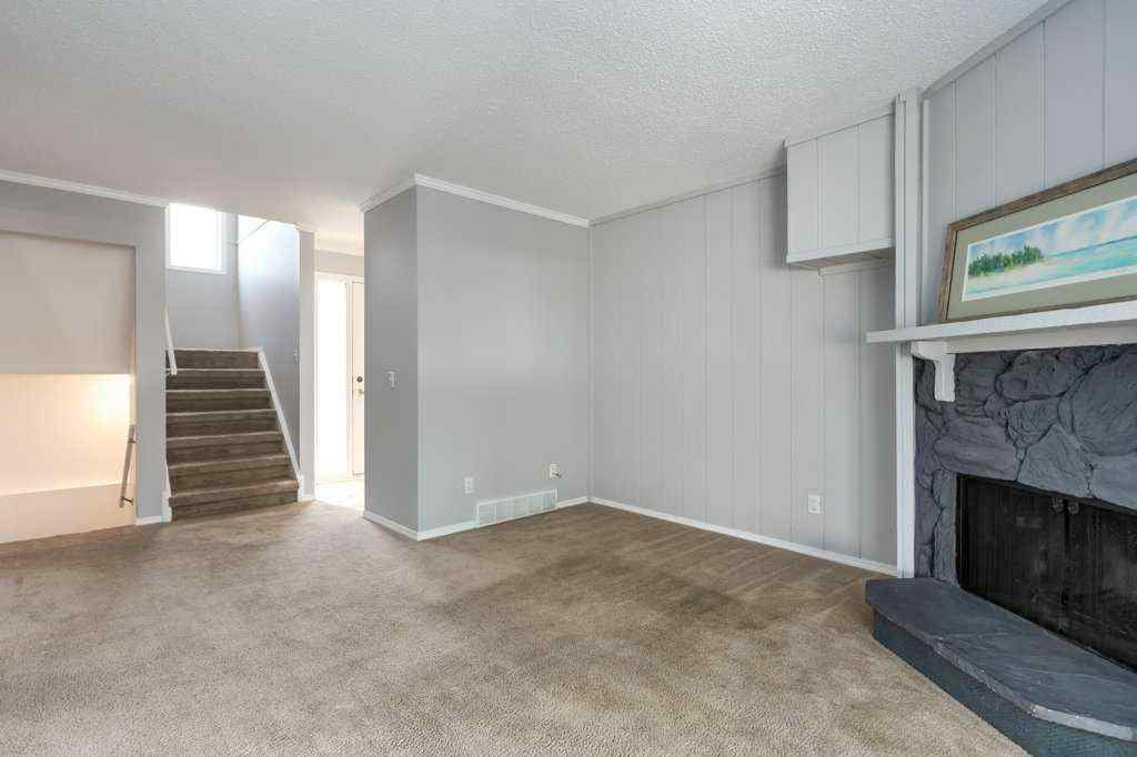 MLS® A2257022 - Unit #104 829 Coach Bluff Crescent SW in Coach Hill Calgary, Residential