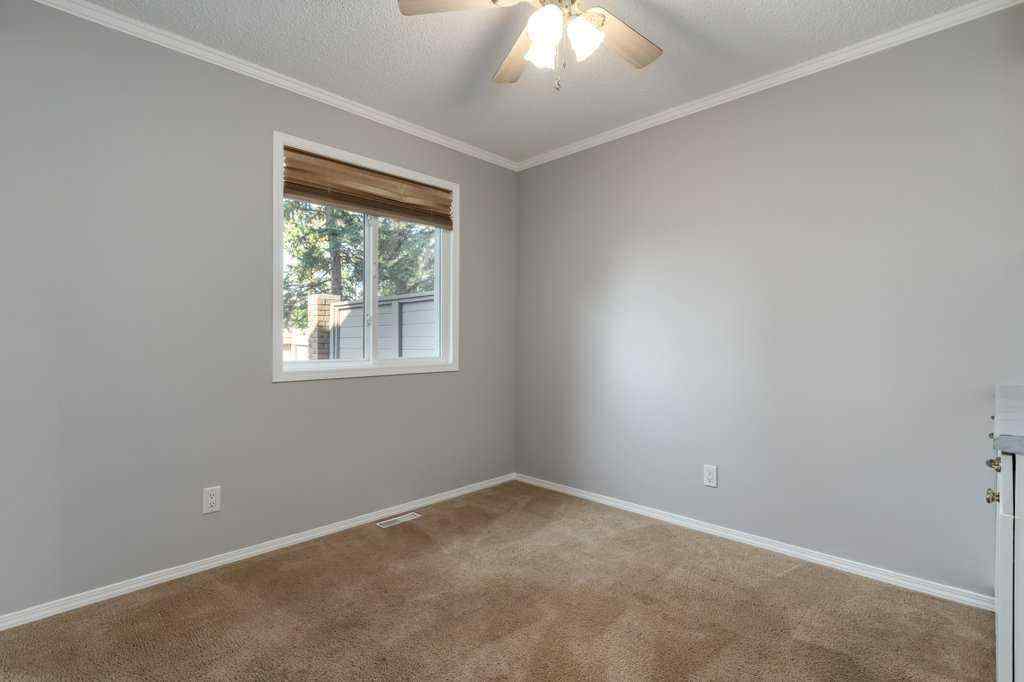 MLS® A2257022 - Unit #104 829 Coach Bluff Crescent SW in Coach Hill Calgary, Residential
