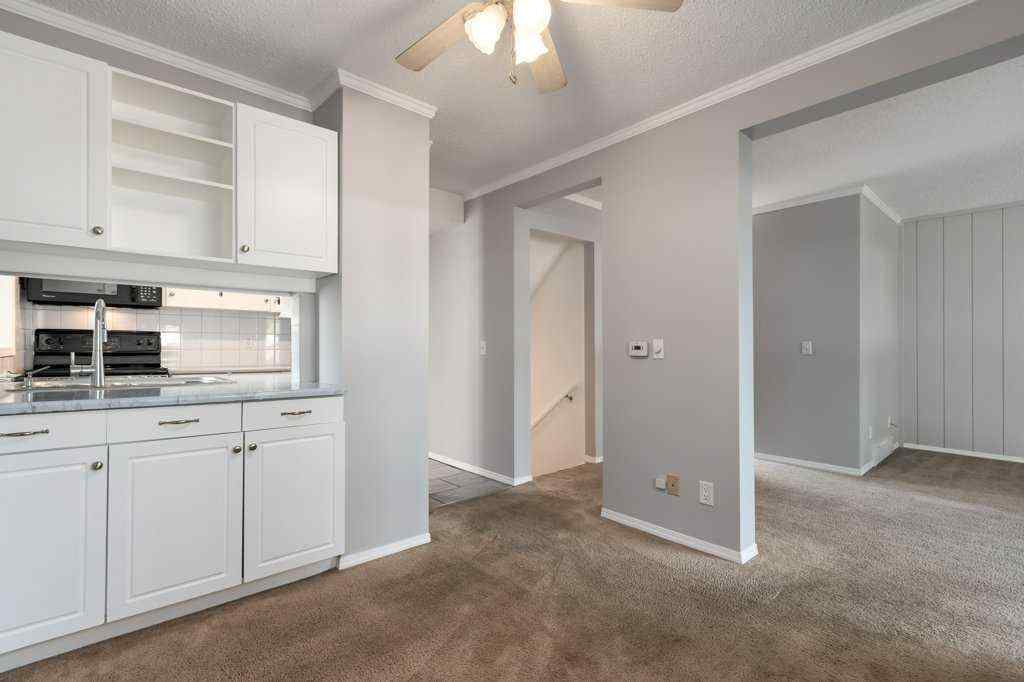 MLS® A2257022 - Unit #104 829 Coach Bluff Crescent SW in Coach Hill Calgary, Residential